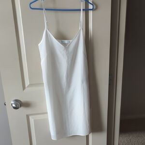 Sandro White Garment with Label Detail